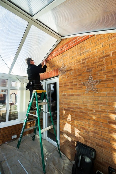 conservatory roofing workers